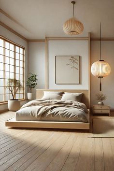 Well-lit bedroom with a large bed as the focal point. The bed has a white quilted headboard and white bedding with a circular pattern. Two brown pillows and one beige pillow on the bed. To the right of the bed, there's a nightstand with a decorative lamp. In the background, an open doorway leading to what appears to be a bathroom. The room has a clean and modern aesthetic with neutral colors and minimal decor. Japanese Modern Bedroom Design, Minimalist Scandinavian Bedroom, Japandi Bed, Japanese Style Apartment, Japanese Living Room Design, Scandinavian Bedroom Design