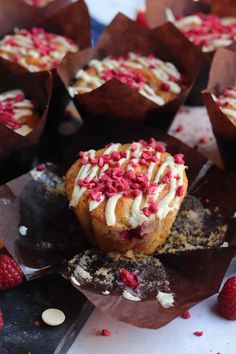 raspberry and white chocolate cupcakes with sprinkles on top