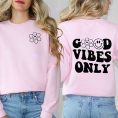 Looking for a cute versatile top to wear? Make sure to grab one of our Graphic Sweatshirts! This soft and comfortable shirt is the perfect top for any outfit. It can be paired with biker shorts, Jeans, or the classic stay at home sweats! This sweatshirt is true-to-size, so be sure to order your regular size! If you are looking for a more oversized look, make sure to size up. Cute Long Sleeve Tops For Everyday, Pink Long Sleeve Slogan Top, Pink Long Sleeve Top With Slogan, Trendy Tops With Funny Print And Comfortable Fit, Trendy Long Sleeve T-shirt With Funny Print, Pink Casual Tops With Comfortable Fit, Trendy Pink Everyday Sweatshirt, Trendy Pink Sweatshirt, Trendy Pink Sweatshirt For Everyday