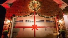 a garage decorated with christmas lights and presents