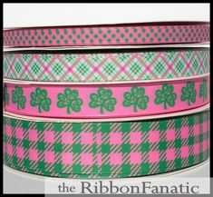 three pink and green plaid ribbon with shamrocks on them