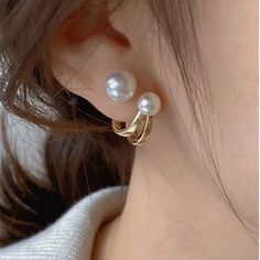 Cute little pearl earrings that wrap around your earlobes, dainty but elegant, lightweight. Includes:♥ 1 pair of earrings♥ 1 Free Gift BoxProduct Details:Dimensions♥ Length: 13 mm / 5/8 inch ♥ Upper Pearl: 7mm ♥ Lower Pearl: 4mm Color ♥ Metal: Gold tone♥ Faux Pearl: WhiteMaterial♥ White Faux Pearls♥ Copper Alloy Needle Earrings, Back Model, Simple Hoop Earrings, Style Français, Womens Earrings Studs, Faux Pearl Earrings, Versatile Jewelry, Pearl Types, Earring Type