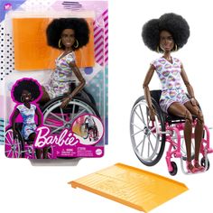 a barbie doll in a wheel chair with an afro hairdow on it's head