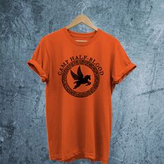 Camp Half Blood T-shirt I Percy Jackson and Olympian SPQR Chronicles Branches T-Shirt I Men, Women, Youths, Toddlers, Infant Shirts Create your own T-shirt ↠ We have size chart on our listing photos. ↠ The shirts are Unisex, Women, Youth, Toddler and Baby size. Orange and Black colors ships next day the other colors may take few more days to ship. ↠ Shipped by next day of order. ↠ Please be advise that, "Burnt Orange" and "Autumn" colors are ONLY available for "Adult Unisex" sizes. If you want t Percy Jackson Camp Half Blood Shirt, Camp Half Blood Shirt Aesthetic, Camp Half Blood Shirt Outfits, Chb Shirt, Camp Half Blood Shirt, Pjo Aesthetic, Apollo Cabin, Blood Shirt, Hipster Tops