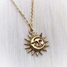 "Sun Moon soulmates necklace D E T A I L S: Sun and Moon face Your choice of gold or silver plated pewter charm, on your gold tone 304 stainless steel, or silver plated brass chain with 1\" extension chain, and lobster clasp closure. Charm size: 21mm x18mm ..: V I E W   S H O P:.. www.lotusfairy.etsy.com www.shopEarthshine.com ..: P O L I C I E S :.. Please see the drop down FAQs menu All items are FINAL SALE. ★ I M P O R T A N T ★ This product is not intended to be used by, or around,  anyone under the age of 13.  ShopEarthshine.com ★ lotusfairy.etsy.com  Canadian buyers:  Prices shown include GST/HST." Sun And Moon Face, Green Iphone Case, Moon Face, Star Chain, Gold Sun, Jewelry Lookbook, Moon Charm, Sun And Moon, Brass Chain