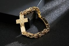 Indulge in the timeless tradition of the Knights Templar with our stunning Commandery Bracelet featuring a dazzling gold cross. Elevate your style with this statement piece while honoring the bravery and noble values of this ancient brotherhood. Own a piece of history and embrace its empowering message.We ship worldwide to 185 countries! Please allow 1-2 business weeks for your order to arrive. Formal Cross-shaped Metal Jewelry, Elegant Metal Cross Bracelet, Elegant Cross Metal Bracelets, Elegant Cross-shaped Metal Bracelet, Gold Metal Cross Jewelry, Gold Cross-shaped Metal Jewelry, Gold Cross Bracelets For Gifts, Templar Cross, Gold Cross