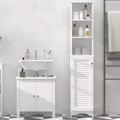 a bathroom with a sink, mirror and shelves on the wall next to each other