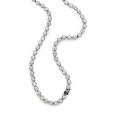 Details Approximately 9.50ct lab white diamonds set in 14k recycled white gold. One of a kind. Necklace dimensions: The length of the necklace is 15 inches, and the width of the chain is 4.85mm. 3mm stones. Each diamond is unique and may vary in shade and appearance from what is depicted on the site. Questions? Get in touch. Description For the love of sparkle and significance, we present the newest addition to our Eternity collection. The Ingot, a signature style harkening to Anna’s metalsmithi Timeless Silver Tennis Necklace With Diamond Accents, Everyday Luxury Silver Tennis Necklace Vvs Clarity, Dazzling Silver Tennis Necklace With Single Cut Diamonds, Silver Tennis Necklace With Single Cut Cubic Zirconia, Diamond White Tennis Necklace With Single Cut Diamonds, Silver Tennis Necklace With Diamond Accents In Platinum, Luxury Silver Platinum Tennis Necklace, Timeless Silver Diamond Cut Tennis Necklace, Silver Tennis Necklace With Single Cut Diamonds