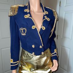 Vintage Victoria Royal Ltd. Military Cropped Beaded Jacket Size 8 Approximately 18 1/2” Armpit To Armpit 18” Shoulder To Shoulder Drycleaned Beading Is In Great Condition Excellent Pre-Owned Condition 4 Snaps Inside, Built In Shoulder Pads Inside Epaulet At End Of Cording Is Slight Fuzzy End, Pic Above It’s Been Like That For Years! Super Unique Piece! Very Hard To Find Royal Fitted Fall Outerwear, Coats Vintage, Royal Long Sleeve Outerwear For Fall, Beaded Jacket, Blue Embellished Fitted Outerwear, Blue Gold, Fitted Blue Embellished Outerwear, Shoulder Pads, Blue Embellished Party Outerwear