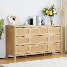 a wooden dresser with drawers in a living room