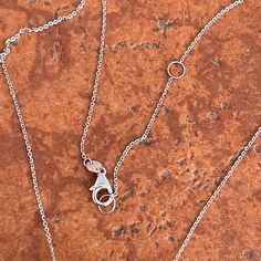 14KT white gold polished-finish dog tag charm/pendant with adjustable diamond-cut chain. Engrave-able for an additional fee. Please reach out to us prior to purchasing for pricing/options. Pendant measures.: 20mm x 17mm Weight: 2.81 grams 11 Gauge Adjustable length: 18"~20" Chain width: 1mm Large 14K lobster clasp Stamped 14K Sterling Silver Heart Pendant Charm Necklace With Cable Chain, White Gold Charm Necklace With Cable Chain For Gift, White Gold Charm Necklace With Cable Chain, Silver Charm Necklace With Round Cable Chain, Round Silver Charm Necklace With Cable Chain, Silver Round Charm Necklace With Cable Chain, Silver Jewelry With Oval Pendant Cable Chain, White Gold Dog Tag Jewelry With Polished Finish, Silver Heart Pendant Necklace With Cable Chain