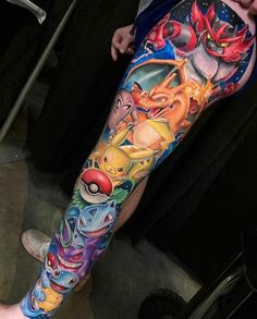 a man's leg with pokemon tattoos on it and other characters in the background