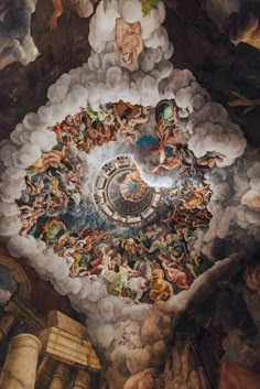 an artistic painting on the ceiling of a building with many people and animals in it