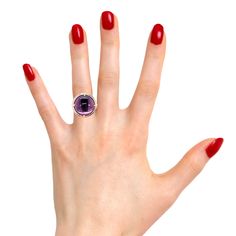 This striking ring features a 14.70 carat amethyst cabochon set in rose gold with bright pink sapphires and diamonds. The amethyst has beautiful crystalline purple color with pinkish highlights, accentuated by the 18k rose gold setting. A row of brilliant diamonds adorns the perimeter of the bezel, followed by a second row of sparkling pink sapphires that together create a stunning frame and make this ring eye-catching from all angles! Perfect for everyday and special occasions! Ring measures ap Luxury Purple Amethyst Cabochon Ring, Luxury Purple Cabochon Amethyst Ring, Luxury Amethyst Cabochon Ring, Purple Amethyst Cabochon Ring Fine Jewelry, Fine Jewelry Purple Amethyst Cabochon Ring, Sapphire And Diamond Ring, Ruby Sapphire, Ring Pendant Necklace, Brilliant Diamond