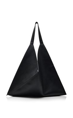 The New York-based label’s genius has always been its ability to craft beautiful pieces that are refreshingly real yet still evoke a sense of emotion.The 'Sara' tote is made from pebbled leather into a geometric, avant-garde silhouette. Easily use yours to fit all the daily essentials. Fall Accessories, Daily Essentials, Moda Operandi, Pebbled Leather, Leather Tote, Fashion Collection, The Black