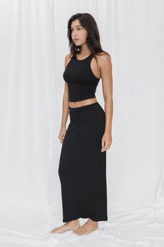 Elegant, feminine and oh so comfy. The long rib skirt fit close to the body whilst being super stretchy and easy to move in. This is loungewear elevated - the ultimate staple for every soft girl. Made from LENZING™ ECOVERO™ ribbed fibers. Body contouring and organic fabric that feels like a second skin Buttery soft and stretchy Hugs your curves at the right places for a sleek look Side seam Length: Size S 93.5cm/37" -Naya is 175cm/68" and is wearing size M. Caitlin is 172cm/67" and is wearing si Rib Skirt, Ribbed Skirt, Organic Fabric, Elegant Feminine, Skirt Fits, Made Clothing, Organic Fabrics, Body Contouring, Soft Girl