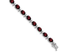 Rhodium over 14k white gold 16 cttw garnet bracelet. Measures approximately 3/16 of an inch in width and has a box catch closure. Classic Gemstone Diamond Bracelet For Formal Occasions, Classic Diamond Gemstone Bracelet For Formal Occasions, Classic Diamond Bracelet With Gemstone For Formal Occasions, Classic Formal Diamond Bracelet With Gemstone, Red Oval Diamond Classic Bracelet, Fine Jewelry Garnet With Polished Finish, Red Oval Classic Diamond Bracelet, Classic Red Oval Diamond Bracelet, Elegant Red Bracelet With Birthstone