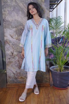 Blue kurta with multicolor resham and beads embroidery in floral motifs. Paired with scallop hem pant. - Aza Fashions Cotton Silk Lawn Suit With Mirror Work, Traditional Mirror Work Kurta For Spring, Bohemian Blue Chanderi Kurta, Bohemian Blue Lawn Suit For Festive Occasions, Blue Bohemian Lawn Suit For Festive Occasion, Blue Chanderi Kurta For Summer, Blue Bohemian Kurta With Resham Embroidery, Designer Blue Lawn Suit With Mirror Work, Blue Resham Embroidery Kurta For Summer