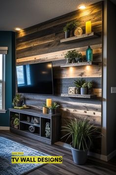 a living room filled with furniture and a flat screen tv sitting on top of a wooden wall