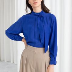 Nwt Color: Cobalt/Royal Blue, Stunning Color Flowy Blouse That Can Be Worn To Many Different Occasions Size Eu 34, But Generous Fit - Will Fit An Xs-M ** Price Firm And/Or Reasonable Offers Only ** Please Note: Item Does Not Come With Neck Tie The Model Is Wearing Blue Blouse Outfit, Cobalt Blue Outfit, Blouse Outfit Work, Working Smart, Royal Blue Blouse, Trouser Outfits, Wide Trousers, Chic Blouses, Fitted Blouses