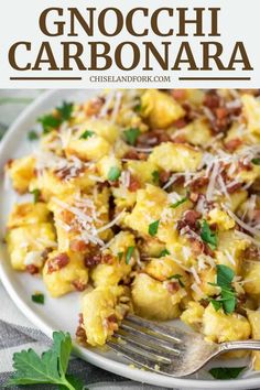 a white plate topped with gnocchi carbonara