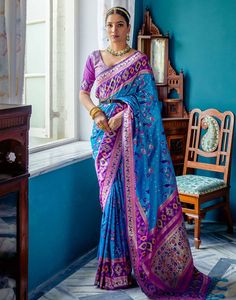 Type: Saree Saree Color: Cerulean Blue Blouse Color: Violet Saree Length: 5.5 Mtrs Blouse Length: 0.80 Mtr Fabric: Paithani Silk Work: Zari Weaving Care Instruction: Hand Wash Product Code: 59707 Contemporary Saree, Modern Saree