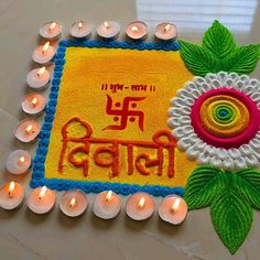 a decorated mat with candles and flowers on it