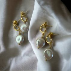 Looking for simple but gorgeous pearl earrings tonight your bridesmaids on your wedding day? These coin pearl drop earrings are simple, light and yet elegant! Perfect  gift for your bridesmaid or for anyone you care about!  Bundle to save more! One pair: $39.95 Two pairs: $59.95, $29.97 a pair Three pairs: $69.95, $23.32 a pair Will come with a pink sliding gift box with a pretty pink soft jewelry pouch free, ready for gift giving! You can't go wrong with this simple jewelry gifts for her! The c 14k Gold Filled Pearl Drop Earrings For Anniversary, Delicate Baroque Pearl White Earrings, Elegant 14k Gold Filled Dangle Teardrop Earrings, Elegant 14k Gold Filled Teardrop Earrings, Anniversary 14k Gold Filled Pearl Drop Earrings, Elegant Pearl Charm Earrings In 14k Gold Filled, Elegant 14k Gold-filled Earrings With Pearl Charm, Elegant 14k Gold Filled Earrings With Pearl Charm, Dainty Gold Teardrop Pearl Earrings