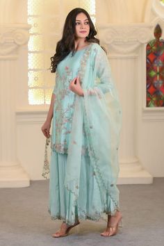 Aqua blue kurta with floral thread and beads embroidery. Paired with coordinating sharara and scallop hem dupatta. - Aza Fashions Blue Dabka Wedding Sets, Blue Resham Embroidered Sharara For Wedding, Blue Chinon Kurta With Dabka, Blue Resham Embroidery Sharara For Wedding, Blue Chinon Straight Kurta Traditional Wear, Blue Georgette Sharara With Dabka Detail, Blue Georgette Sharara With Dabka Embroidery, Designer Light Blue Straight Kurta Set, Light Blue Straight Kurta Set With Dupatta