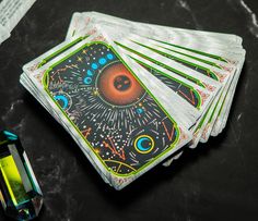 four playing cards are sitting on a table