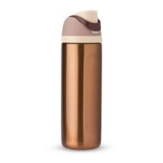 thermos bottle in rose gold is shown on a white background