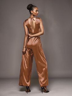 This soft satin jumpsuit features a flattering v-neck design, making it the perfect choice for mothers of the bride. Its dress pantsuit style provides comfort and elegance, while its high-quality material ensures a polished look. Stay stylish and comfortable on that special day with our jumpsuit. Dress Pantsuit, Mother Of The Groom Dress, Satin Jumpsuit, Velvet Jumpsuit, Peacock Green, Mother Of The Bride Dress, Groom Dress, Mother Of The Groom, Different Fabrics