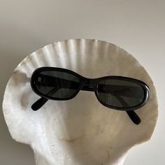 These slim round oval sunglasses are your everyday classic.  Featuring a black frame with smoke lens. This style is unisex.  True genuine vintage sunglasses from the 90s.  - 400 uv  - new vintage from the 90s - includes sunglasses pouch  Also available in tortoise https://etsy.me/3CPd8yg Black Rectangle Sunglasses, 90s Sunglasses, Nice Glasses, Sunglasses Pouch, Black Rectangle, Rectangular Sunglasses, Rectangle Sunglasses, Vintage Sunglasses, Oval Sunglasses