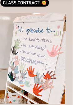 a sign with handprints on it that says we cannot't to be kind to others