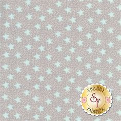 a beige background with small white flowers on it