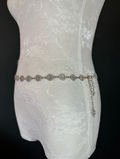 High Quality Rhinestone Ring Belt in Silver colour. This fashionable belt is beautiful and will make a perfect gift.  Perfect to accompany dresses, tops, swimwear and bridalwear.  Exclusively designed by FAN Design, FAN Fashion Handcrafted in a range of sizes.  Teen sizes though to waist size 60". For larger belts send me a convo.  Perfect wardrobe accessory or gifts. Formal Silver Adjustable Bridal Belt, Adjustable Silver Bridal Belt For Formal Occasions, Silver Adjustable Bridal Belt For Formal Occasions, Adjustable Silver Crystal Bridal Belt, Elegant Silver Bridal Belt With Bling, Elegant White Bridal Belt With Bling, Silver Crystal Bridal Belt With Bling, Bridal Swimwear, Ring Belt