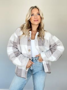 Enhance your winter style with our Snowy Haven Fleece Jacket. The collared neckline and button closures add an elevated touch, while the fuzzy and soft fabric provides ultimate comfort and coziness. With a relaxed fit, drop shoulders, and rounded hem, it's perfect for a coffee run, shopping trip, or brunch date. This versatile piece is chic, trendy, and perfect for layering. Stay warm and stylish all season long. Fabric 100% Polyester Hand wash cold. Soft Texture Fleece Jacket For Fall, Comfy Soft-texture Fall Outerwear, Cozy Fleece Jacket For Fall Loungewear, Soft Texture Outerwear For Loungewear, Comfortable Soft Outerwear For Loungewear, Comfy Long Sleeve Fleece Outerwear, Comfy Fall Outerwear For Loungewear, Cozy Fall Shacket For Cold Weather, Cozy Fit White Outerwear With Soft Texture