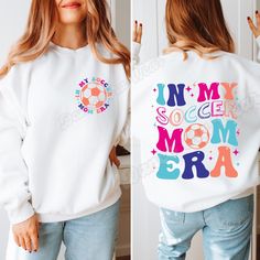 This In My Soccer Mom Era graphic crewneck sweatshirt is such a fun way to show off your love for your Soccer Player! Whether you're looking for the perfect Soccer Mom sweatshirt or you're buying the perfect gift for a Soccer Mom friend , this trendy Soccer pullover sweater is sure to make everyone smile. This cute Soccer Mom sweatshirt is also available in a Comfort Colors® T shirt style. Visit our shop to see them and other sweatshirts & shirts! ▸ Gildan Brand Sweatshirt in WHITE ▸ Unisex Adult Sizing   ▸ 50% Cotton, 50% Polyester ▸ Medium-Heavy Fabric ▸ Rolled Sleeves in pictures is for styling purposes only   ▸ Props used In photos are NOT included with purchase SIZE ▸ Take a look at the photos to see a specific sizing chart for this sweatshirt style ▸ Please note that these sweatshirt Funny White Sweatshirt With Text Print, Mother's Day Graphic Print Crew Neck Sweatshirt, White Sweatshirt With Funny Print, Mother's Day Crew Neck Sweatshirt With Lettering, Fun White Crew Neck Sweatshirt, Mother's Day Graphic Print Sweatshirt, Mother's Day Lettering Crew Neck Sweatshirt, Mother's Day Custom Print Crew Neck Sweatshirt, Mother's Day Casual Sweatshirt With Custom Print