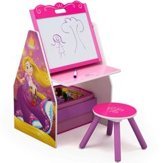 Disney Princess Kids Desk Easel Play Station Arts Crafts Drawing Storage Stool This Disney Princess Kids Desk Easel Play Station Arts Crafts Drawing Storage Stool provides the space and storage for your child's needs. The 3-in-1 design features a magnetic dry-erase board that can be positioned for your child to sit and draw with markers, or stowed upright to reveal a spacious tabletop to complete homework, arts and crafts projects. On the other side of the easel a fabric toy bin and two tiers of Disney Princess Activities, Kids Art Table, Princess Activities, Kids Easel, Desk Stool, Toy Organizer, Play Station, Activity Center, Toy Bins