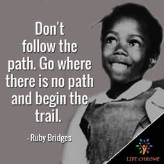 a black and white photo with the quote, don't follow the path go where there is no path and begin the trail