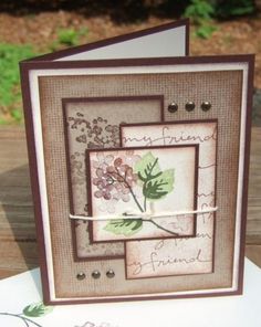 a close up of a greeting card with flowers on the front and back side,