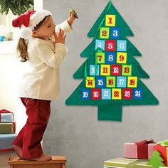 Big Felts Christmas Tree 24 Days 2022 Christmas Arrivaling Calendar Christmas Countdown 36.6x29 Inch Calendar Christmas Tree Wall Decoration Features: materials: Made of the highest quality standard, our felts Christmas tree is thick, durable and easy to store. The GIFTS and educational toy: just hang it on the door or wall. FELTS trees will provide Funny for your children. Your children can quickly paste accessories onto the FELTS tree, they can play together to practice their hand eye coordination and interaction abilities. Countdown 24 days before Christmas: 24 individually numbered pockets allow children to easily count to Christmas and put candy, gifts or decorations in the pockets every day. Warm Christmas atmosphere: Decorated colorful Christmas FELTS trees will create a warm Christ Tree Wall Decoration, Christmas Tree Advent Calendar, Advent For Kids, Christmas Tree Wall, Advent Calendars For Kids, Calendar Christmas, Christmas Savings, Christmas Countdown Calendar, Felt Tree