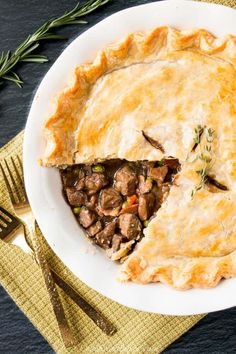 steak and mushroom pot pie on a white plate