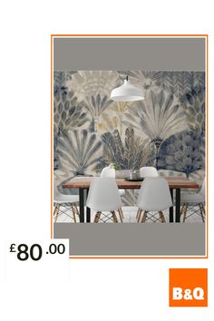 a dining room table with chairs and a lamp on it, next to a wallpapered background