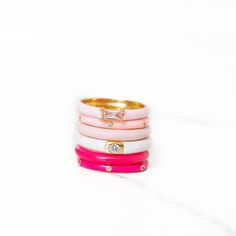 Sparkly, shiny, and oh-so-pink, this ring with a baguette gem is sure to make your finger pop! Sized at a 7, it's the perfect addition to any outfit. Modern Pink Promise Ring, Trendy Enamel Ring For Everyday, Pink Fine Jewelry For Everyday, Everyday Fine Pink Jewelry, Pink Stackable Diamond Ring In Fine Jewelry Style, Trendy Everyday Pink Rings, Pink Stackable Crystal Promise Ring, Pink Stackable Enamel Ring As A Gift, Pink Enamel Ring As A Gift