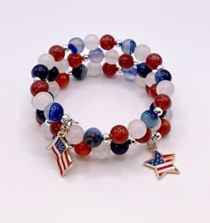 Red Carnelian, White Jade & Blue Agate round beads with silver spacers Beads - Flag and Heart Charm - Memory Wire Bracelet This is a well quality Bracelet for your next 4th of July Celebration or patriotic party. This Bracelet wrap 17 inches in length and is a great piece to add to your jewelry collection. beads are about 8mm. You will receive a nylon gift bag for your gift giving. You will choose gift bag color at checkout. If you have any questions send me a message. Red Round Beads Bracelets For 4th Of July, Multicolor Round Beads Bracelet For 4th Of July, Patriotic Round Beads Stretch Bracelet For 4th Of July, Patriotic Round Beads Jewelry Gift, Patriotic Blue Round Bead Jewelry, 4th Of July Gift Round Beads Stretch Bracelet, Patriotic Red Beaded Bracelets With Round Beads, Beaded Bracelet For 4th Of July, Patriotic Red Beaded Bracelet With Round Beads