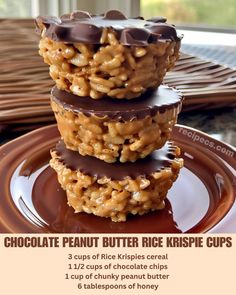 three chocolate peanut butter rice krispies stacked on top of each other