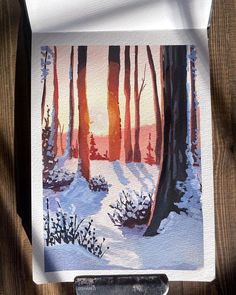 a watercolor painting of trees and snow on a wooden surface with the sun setting in the background