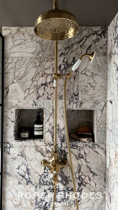 The perfect balance of light and dark, the design perfectly reflects Reece's design ethos, seamlessly carrying through his home's singular aesthetic. Discover how to recreate the look. Roper Rhodes, Sophisticated Bathroom, Marble Showers, Maximalist Design, Zellige Tile, Calacatta Marble, Gold Bathroom, Amber Interiors, Interior Photo