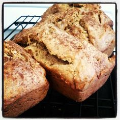 some type of bread that is cooling on a rack